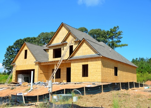 A New Home under Construction under Blue Sky | TZCons.com