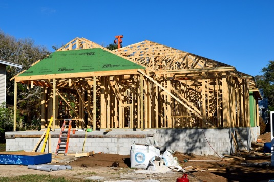 New Home under Construction beneath Blue Sky | TZCons.com